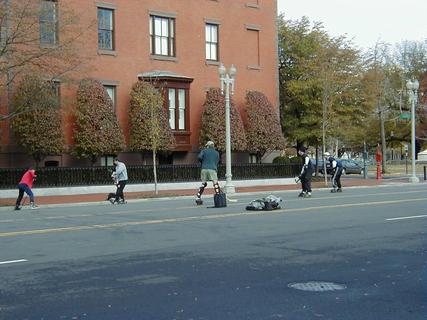 Guys playing rollerblade hockey outside White House<br>Location: <a href="https://www.google.com/maps/search/?api=1&query=38.89871,-77.03841" target="_new">Pennsylvania Ave NW</a>